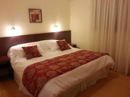 Habitación Grand Hotel Reconquista con aire acondicionado